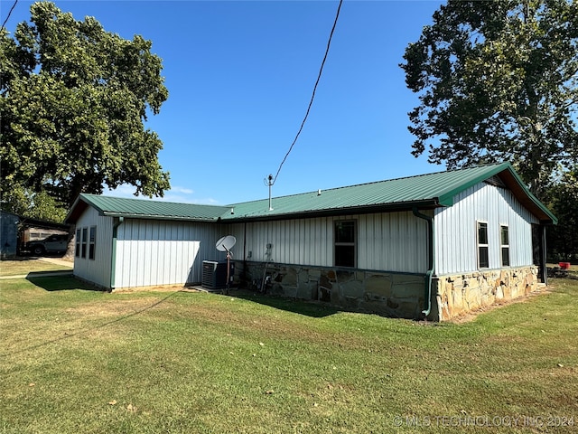 view of home's exterior featuring a lawn