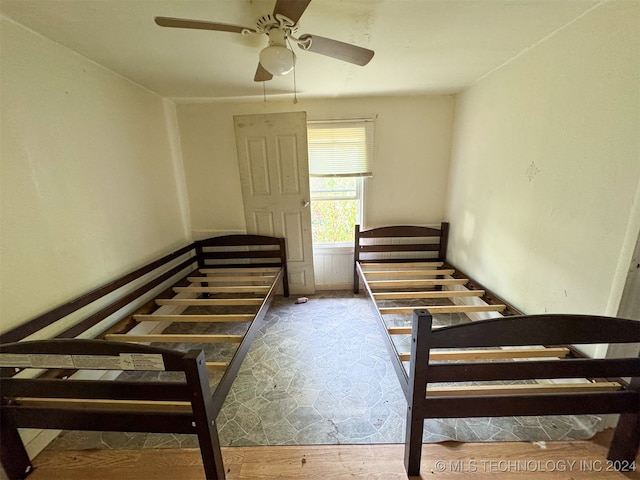 unfurnished bedroom with hardwood / wood-style flooring