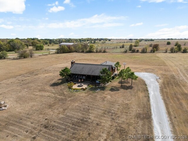 birds eye view of property featuring a rural view