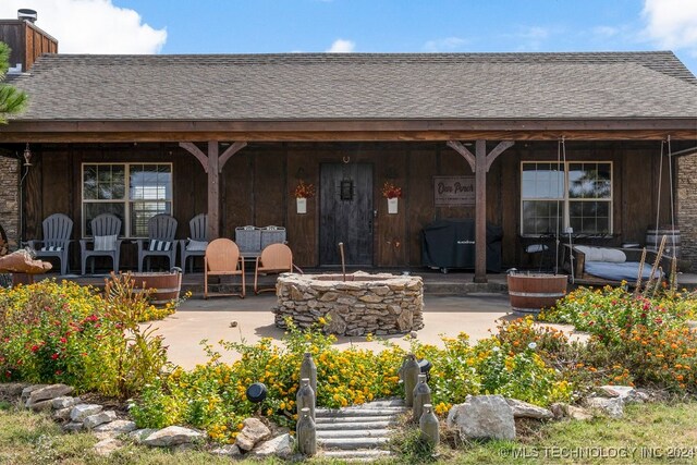 back of house featuring a patio