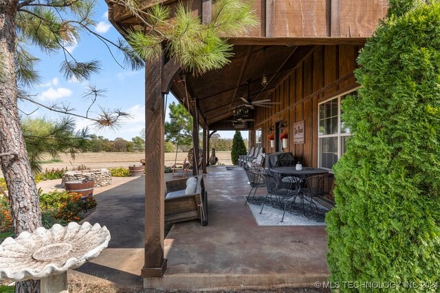 view of patio / terrace featuring ceiling fan