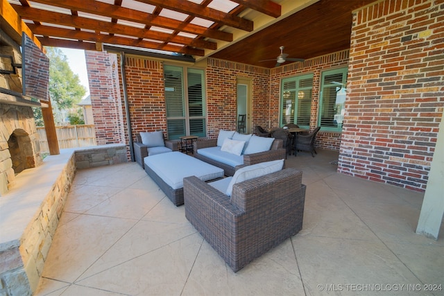 view of patio featuring outdoor lounge area, a pergola, and ceiling fan