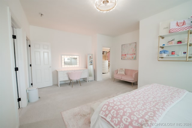 bedroom with light colored carpet