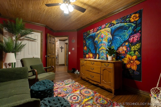 sitting room with crown molding, ceiling fan, hardwood / wood-style floors, and wooden ceiling