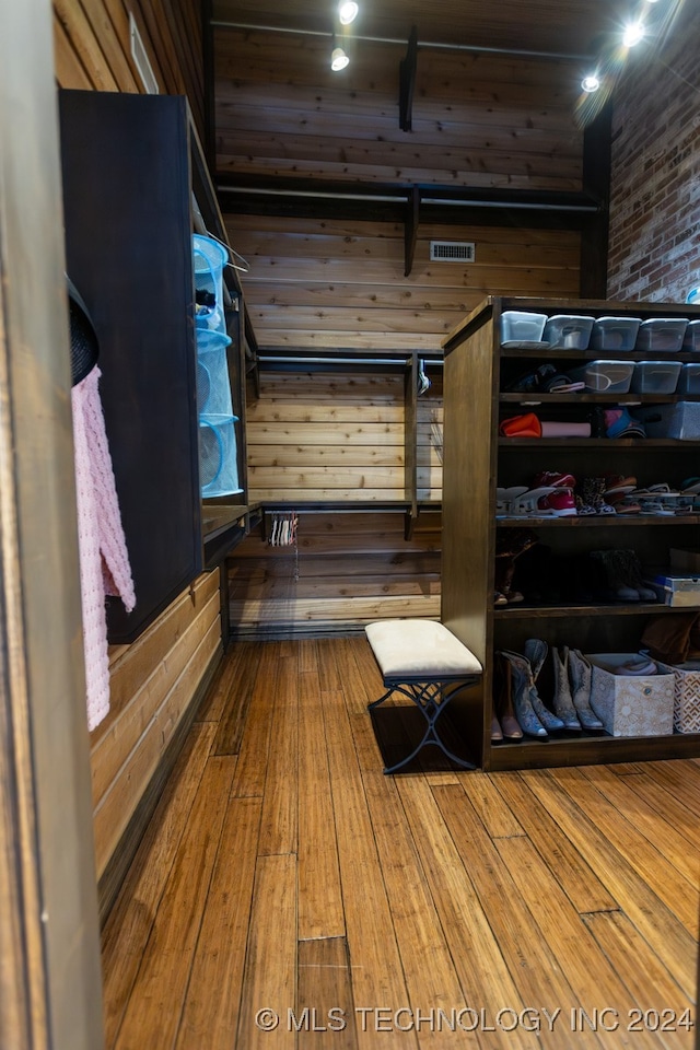 spacious closet featuring wood-type flooring