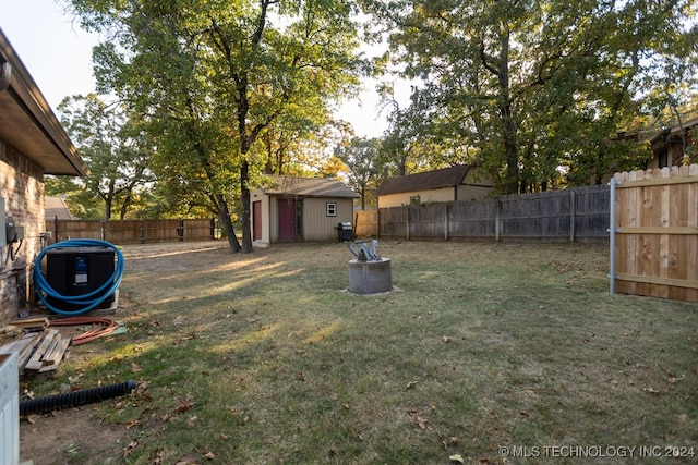 view of yard with a storage shed