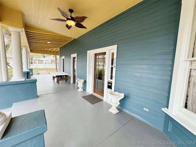 view of patio with a porch and ceiling fan