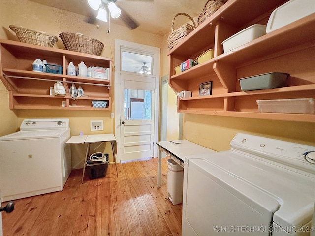 clothes washing area with independent washer and dryer, light hardwood / wood-style flooring, and ceiling fan