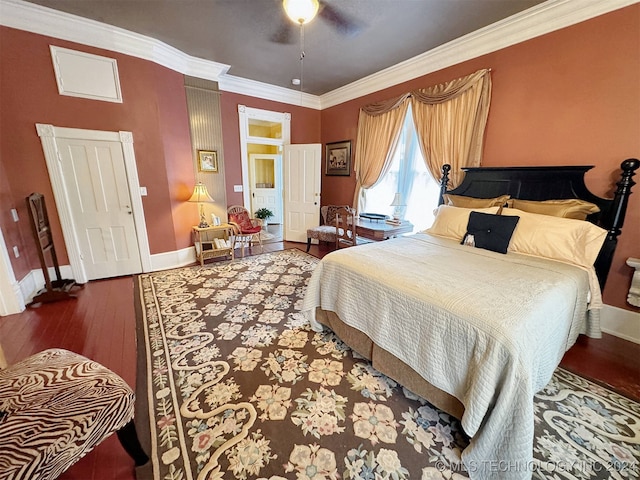 bedroom with crown molding, hardwood / wood-style flooring, and ceiling fan