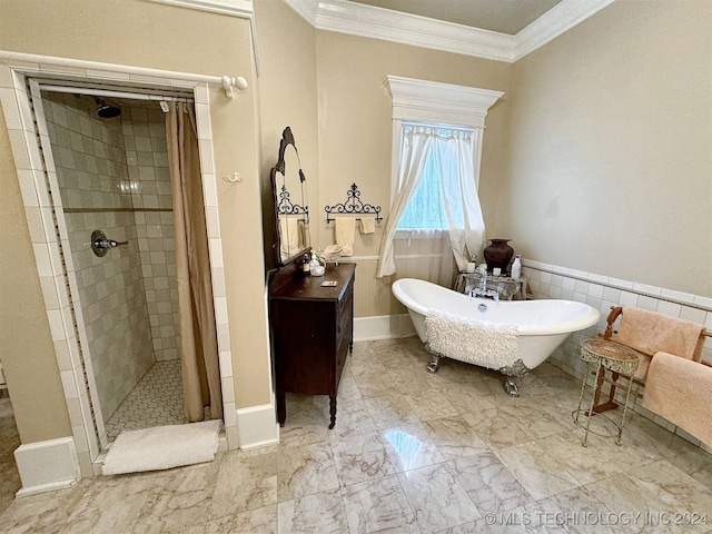 bathroom with crown molding, vanity, and plus walk in shower