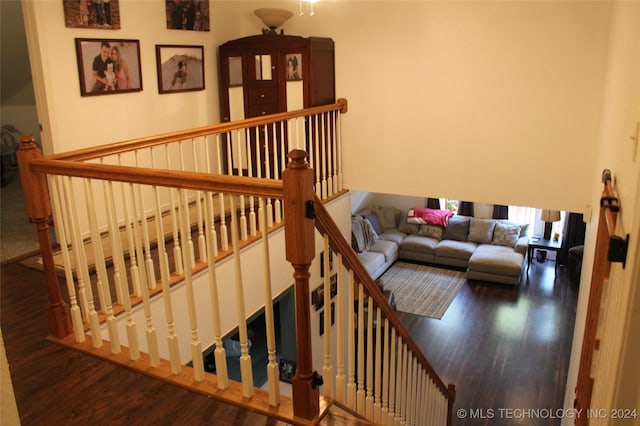 staircase featuring hardwood / wood-style floors