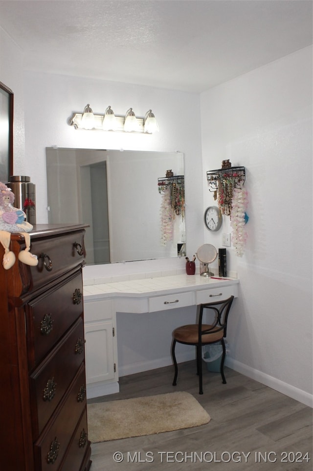 bathroom featuring wood-type flooring