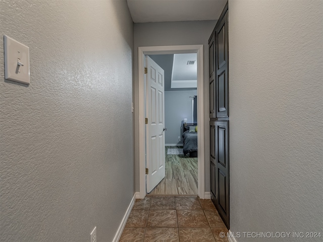 hall featuring dark wood-type flooring