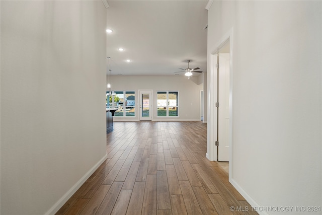 corridor featuring light hardwood / wood-style floors