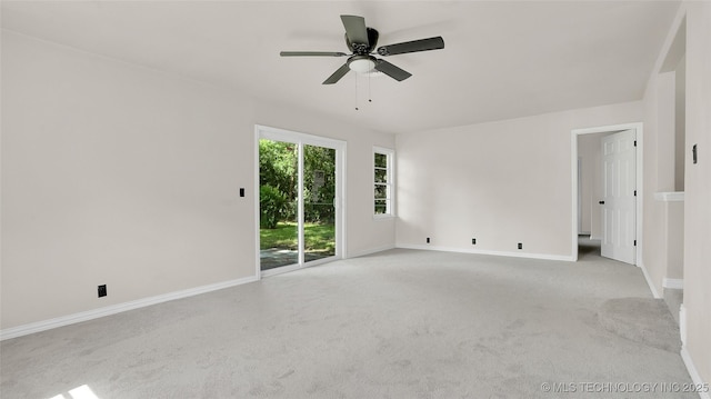 711 NW Elizabeth St, Ardmore, OK 73401 - spare room with light colored carpet and ceiling fan