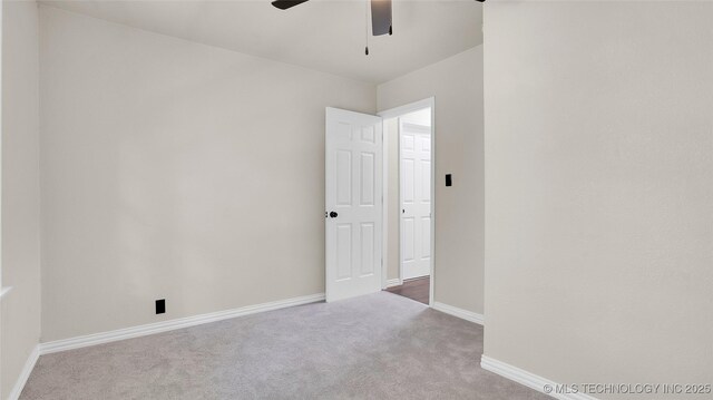 711 NW Elizabeth St, Ardmore, OK 73401 - carpeted spare room featuring ceiling fan