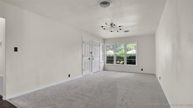 711 NW Elizabeth St, Ardmore, OK 73401 - view of carpeted empty room