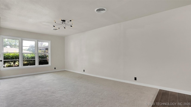 711 NW Elizabeth St, Ardmore, OK 73401 - view of carpeted spare room