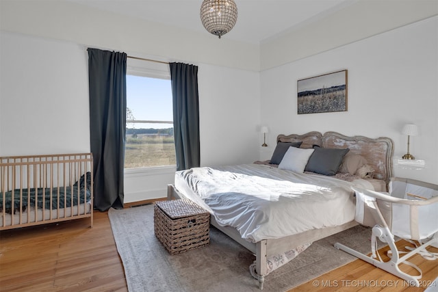 bedroom featuring hardwood / wood-style floors