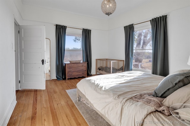 bedroom featuring wood-type flooring