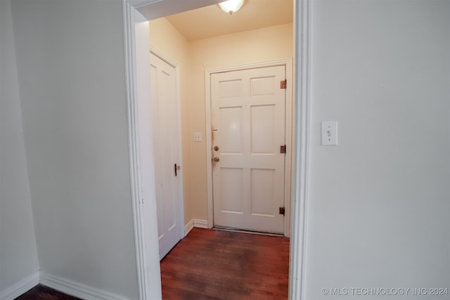 doorway to outside with dark hardwood / wood-style flooring