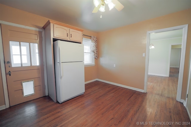 kitchen with ceiling fan, white cabinets, white refrigerator, and dark hardwood / wood-style flooring