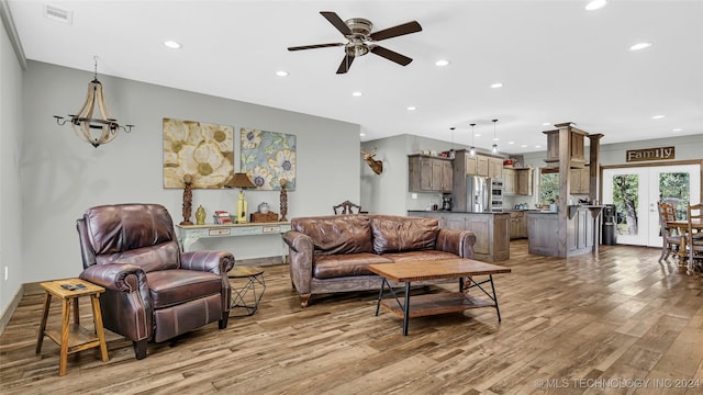 6126 Kings Rd, Ardmore, OK 73401 - living room featuring light wood finished floors, a ceiling fan, and recessed lighting