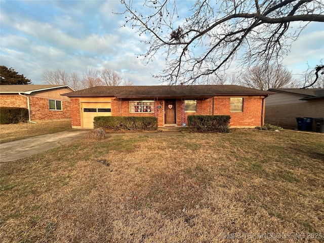 single story home featuring a garage and a front lawn