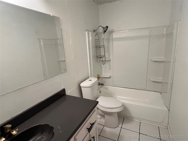 full bathroom featuring tile patterned flooring,  shower combination, vanity, and toilet