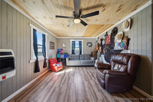 living room featuring wooden walls, wood ceiling, and hardwood / wood-style floors