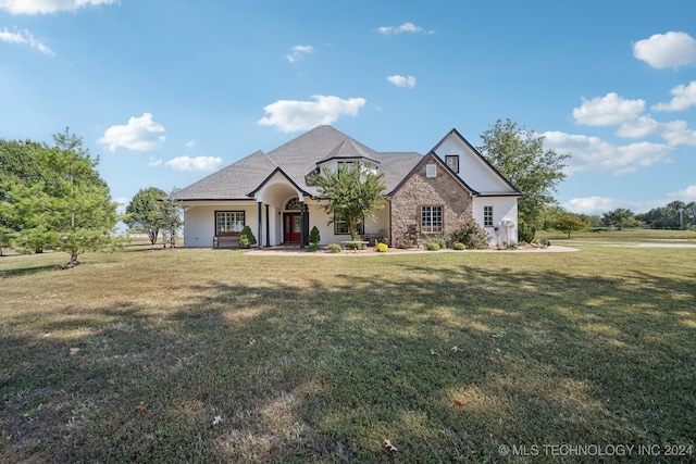 view of front of house featuring a front yard