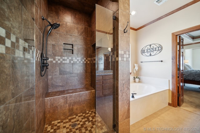 bathroom featuring tile patterned flooring, crown molding, and independent shower and bath