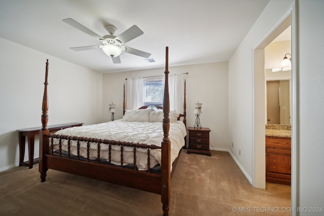 carpeted bedroom featuring ceiling fan and connected bathroom