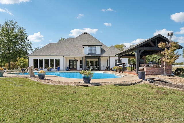 view of swimming pool featuring a gazebo, a yard, and a patio area