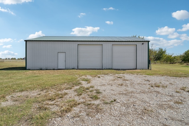 view of outbuilding with a garage