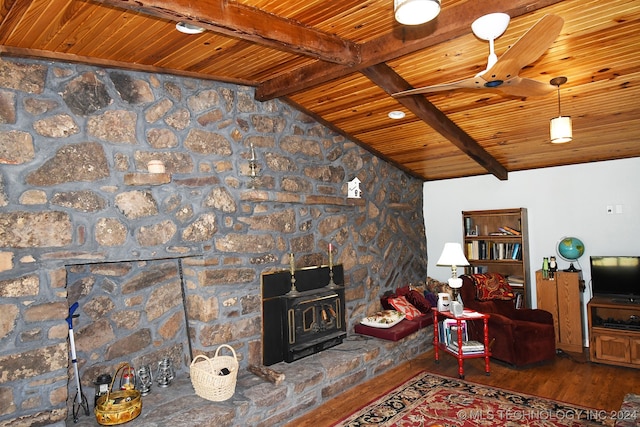 living room with a wood stove, lofted ceiling with beams, wood ceiling, and wood-type flooring