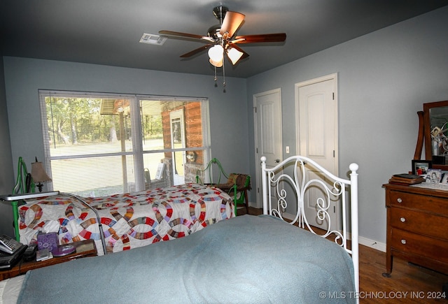 bedroom featuring ceiling fan and wood-type flooring