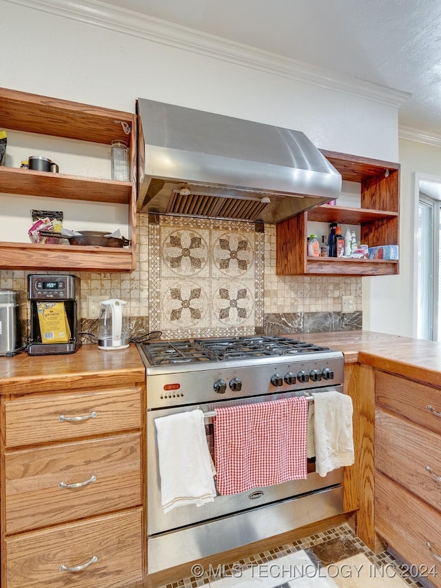 kitchen featuring open shelves, wall chimney exhaust hood, ornamental molding, high end stainless steel range, and decorative backsplash