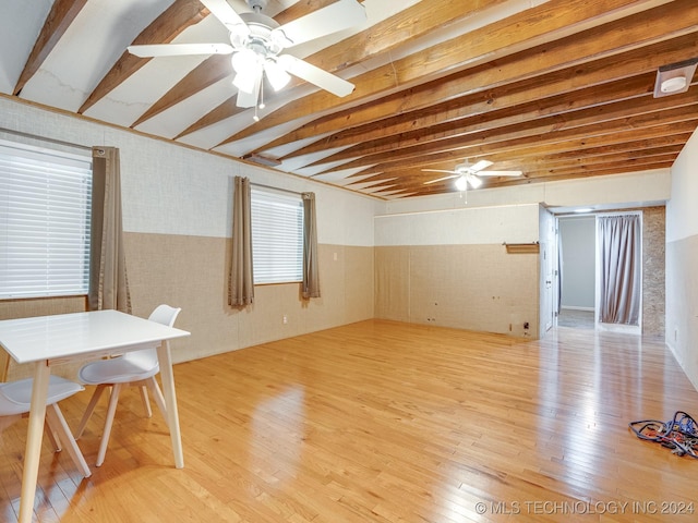 interior space featuring a ceiling fan and hardwood / wood-style flooring