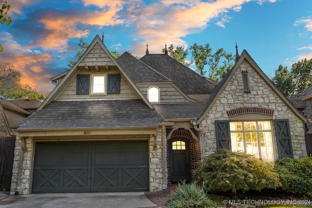 tudor home with a garage