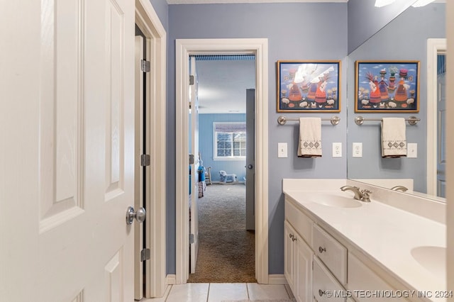 bathroom with vanity and tile patterned floors