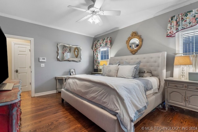 bedroom with ceiling fan, ornamental molding, and dark wood-type flooring