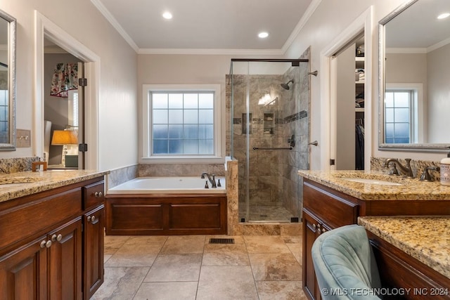 bathroom with vanity, separate shower and tub, and crown molding