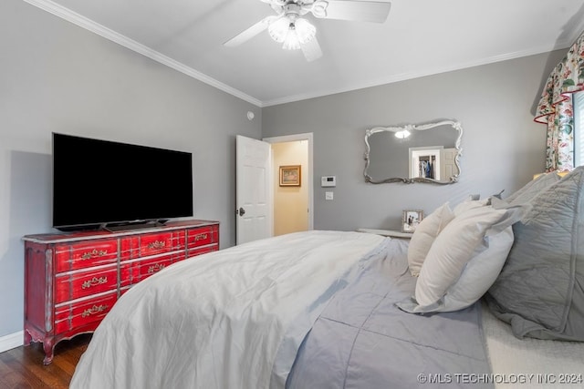 bedroom featuring crown molding, hardwood / wood-style floors, and ceiling fan