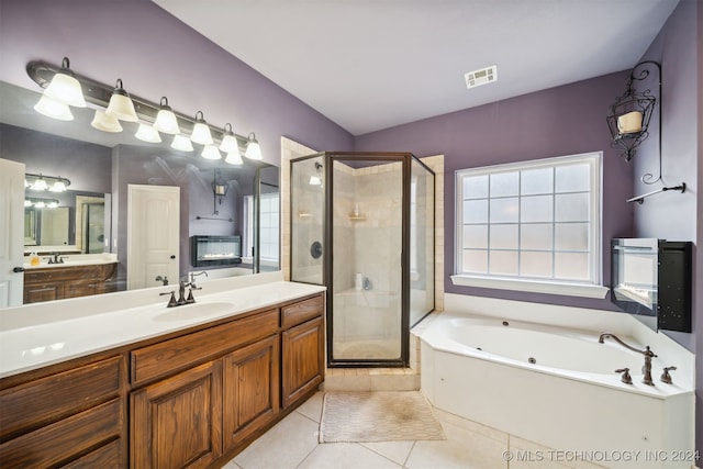 bathroom with vanity, separate shower and tub, and tile patterned flooring