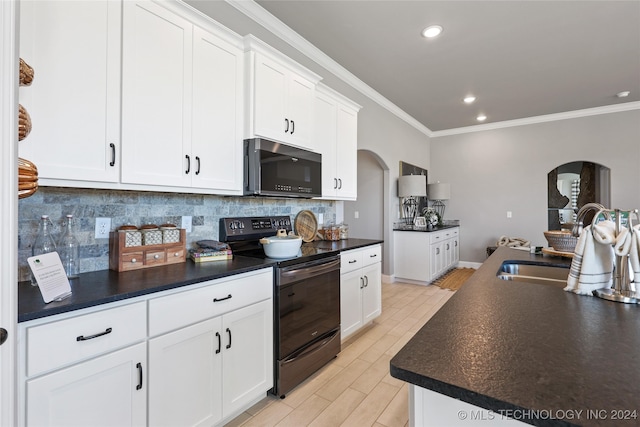 kitchen with decorative backsplash, white cabinetry, crown molding, and black range with electric stovetop