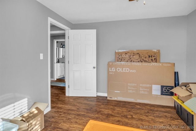 bedroom featuring dark wood-type flooring