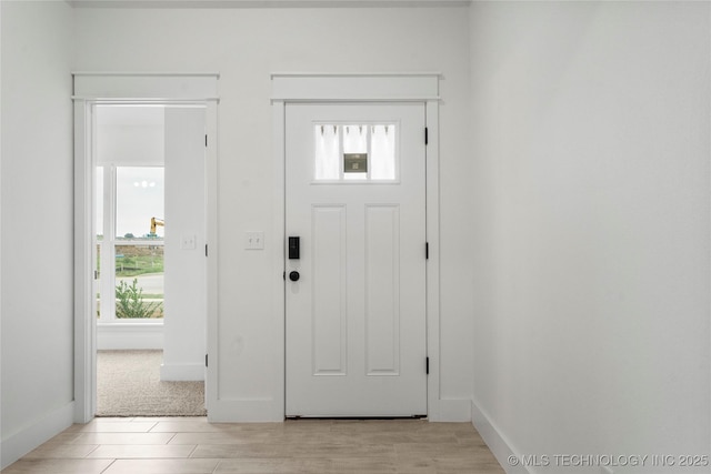 10812 S 274th Ave E, Coweta, OK 74014 - foyer featuring baseboards and light wood finished floors