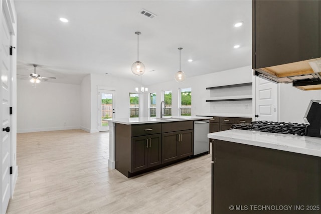 10812 S 274th Ave E, Coweta, OK 74014 - kitchen with stainless steel dishwasher, a sink, plenty of natural light, open shelves, and recessed lighting