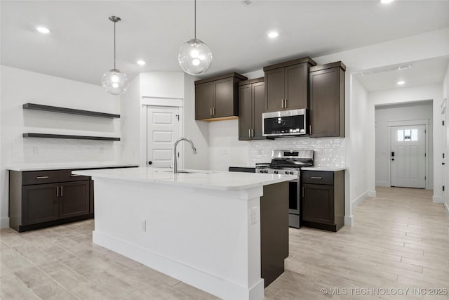 10812 S 274th Ave E, Coweta, OK 74014 - kitchen with appliances with stainless steel finishes, open shelves, decorative backsplash, recessed lighting, and dark brown cabinets